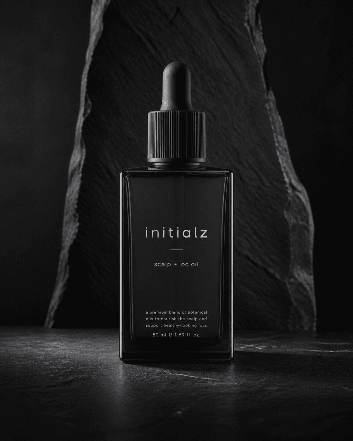 Scalp & Loc Oil — initialz